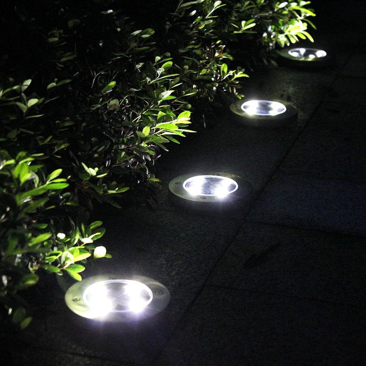 Set 4 x lampa solara cu 4 leduri si senzor de lumina cu fixare in sol Lampi Solare
